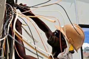 man working with cables