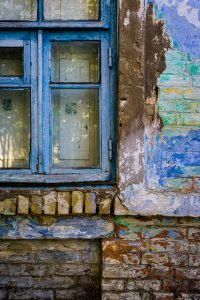 old window, holes around the outside